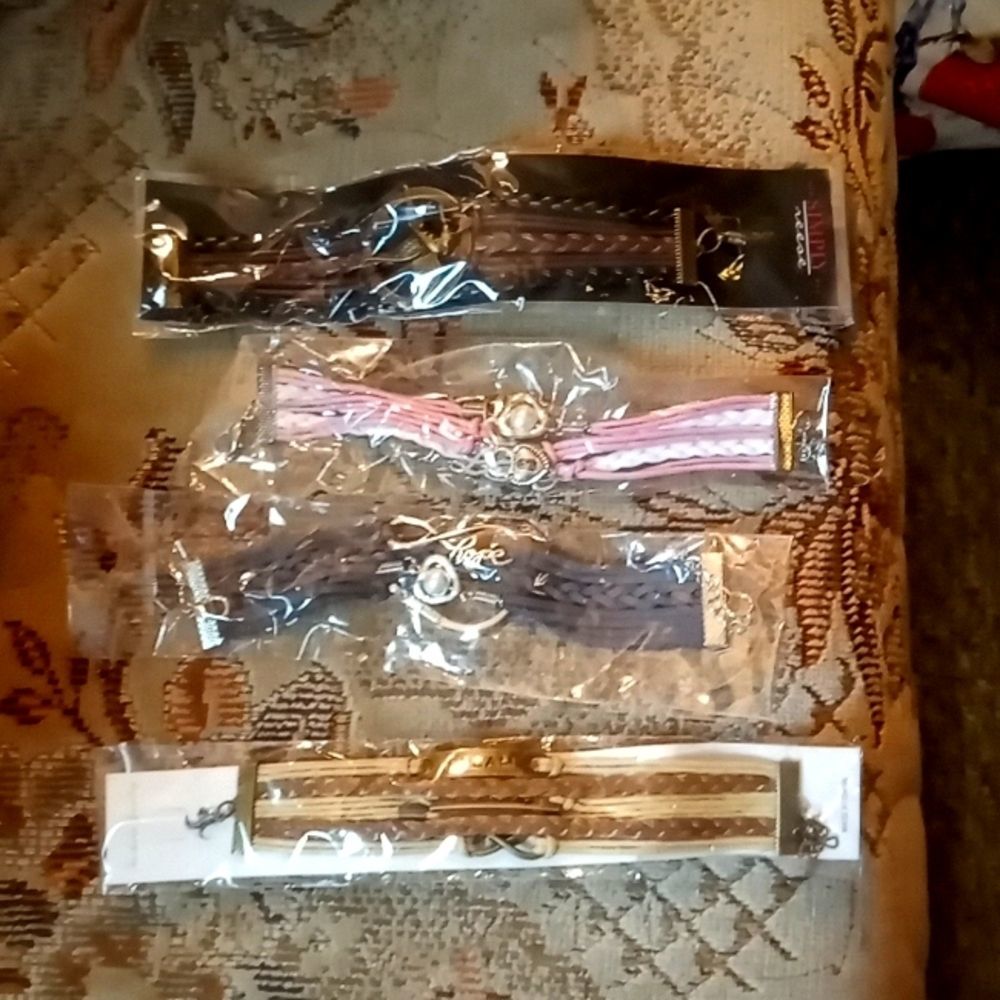 Rawhide cord bracelets.